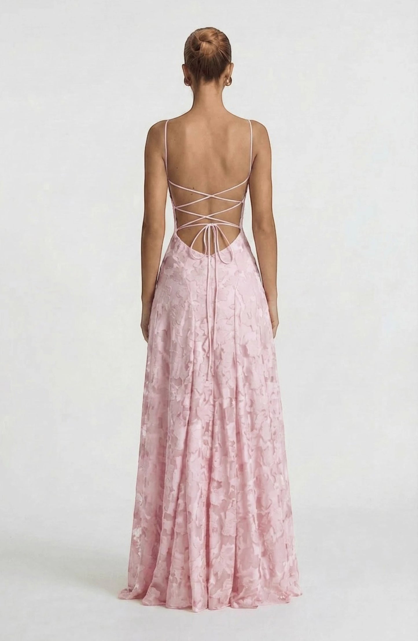Elegant flowy bridal dress by LORVENES featuring a soft, flowing fabric and intricate details for a romantic wedding look.