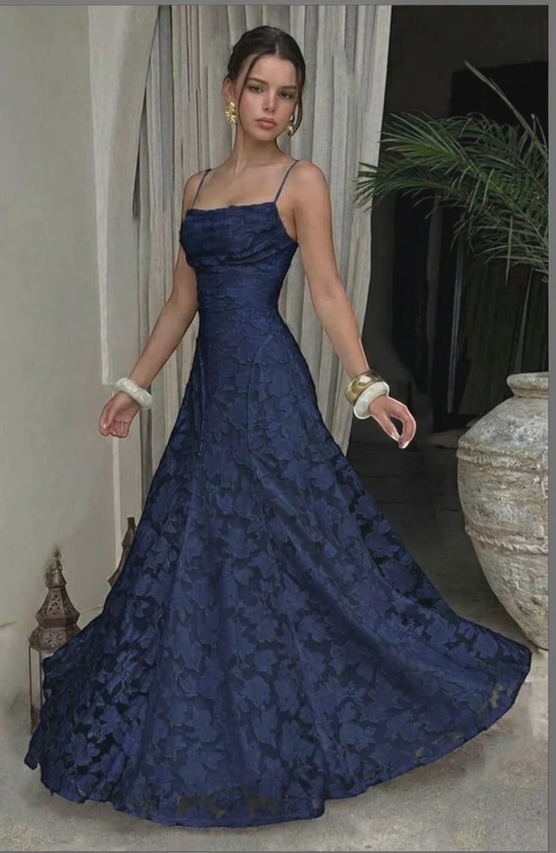 LORVENES sexy flowy bridal dress with a flowing silhouette and elegant design, perfect for a wedding or special occasion.