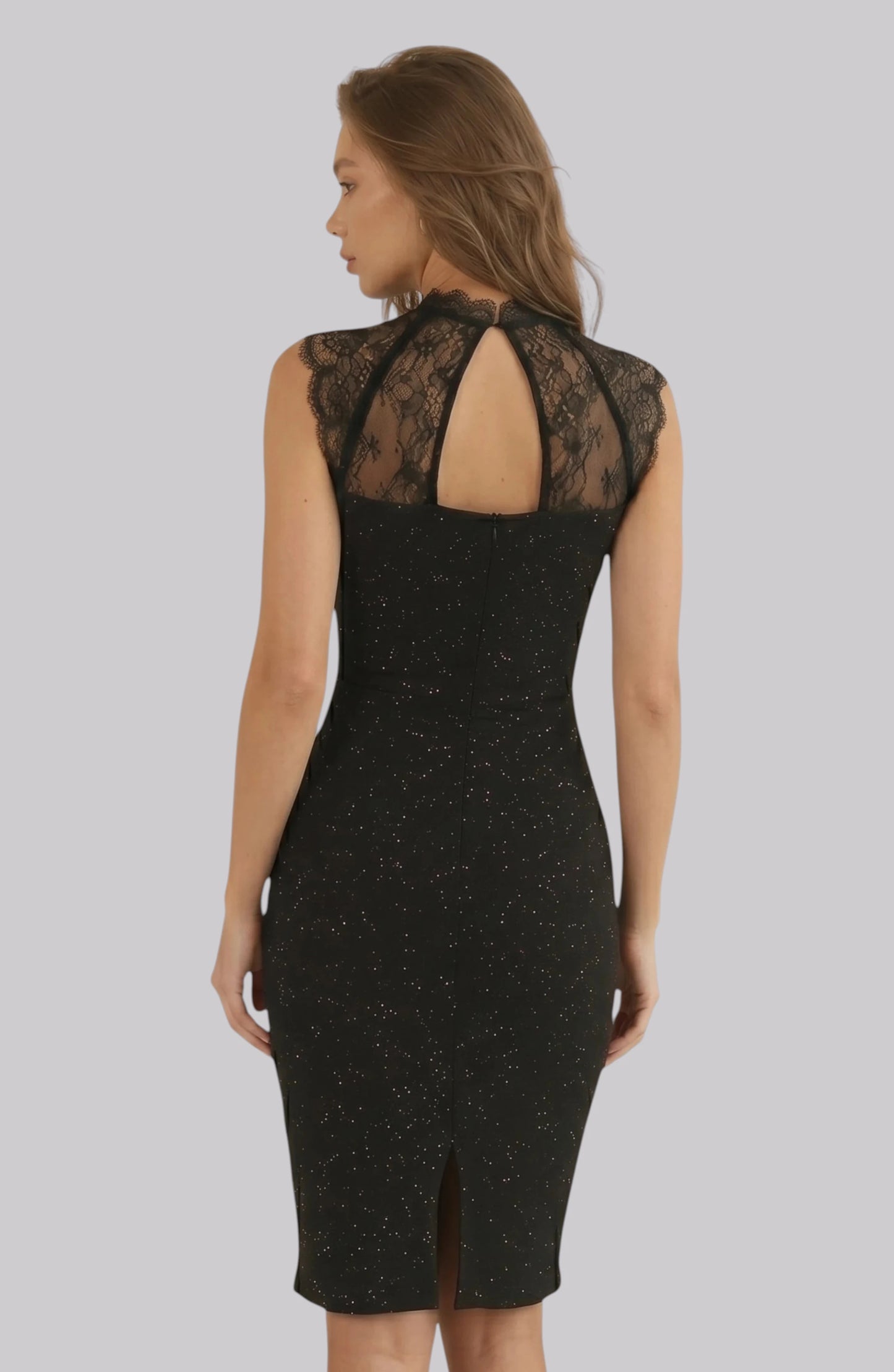 LORVENE Midnight Sequin Dress featuring a fitted silhouette, shimmering sequins, and elegant design for evening wear.