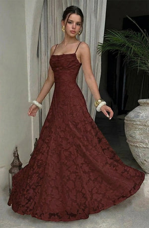 Elegant flowy bridal dress by LORVENES featuring a soft, romantic silhouette and delicate fabric, perfect for a wedding ceremony.