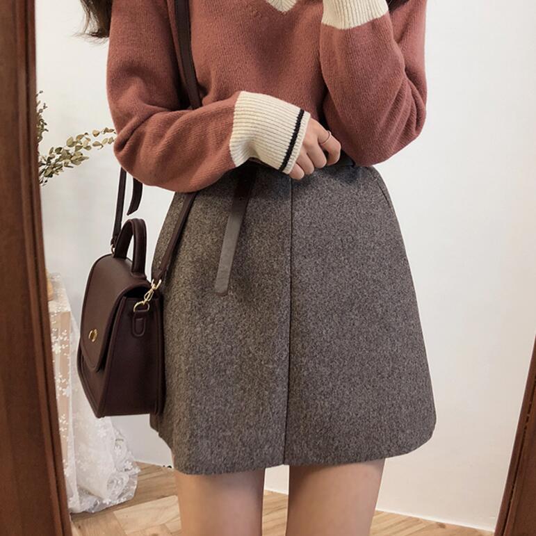 LORVENE Chic Luxe skirt in elegant fabric, with a stylish design and tailored fit, displayed on a hanger against a neutral background.