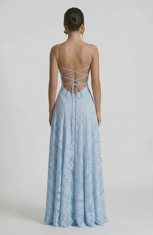 LORVENES sexy flowy bridal dress shown from the back, featuring elegant fabric and a graceful silhouette for wedding attire.