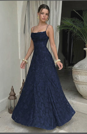 LORVENES sexy flowy bridal dress in soft fabric with elegant drape, displayed on a neutral background.