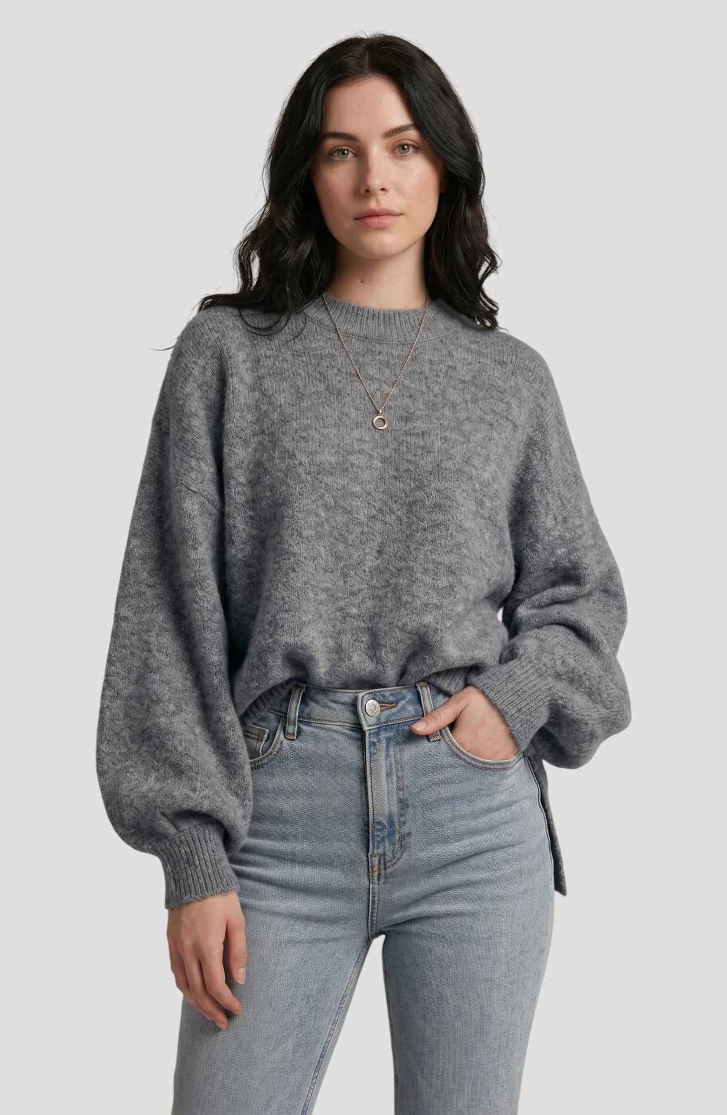 LORVENE cropped rib pullover shown in bottom-left pose, featuring a relaxed fit and ribbed fabric, in a neutral color.