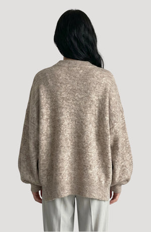 LORVENE cropped rib pullover displayed in a top-right pose, showcasing the textured knit fabric and stylish fit.