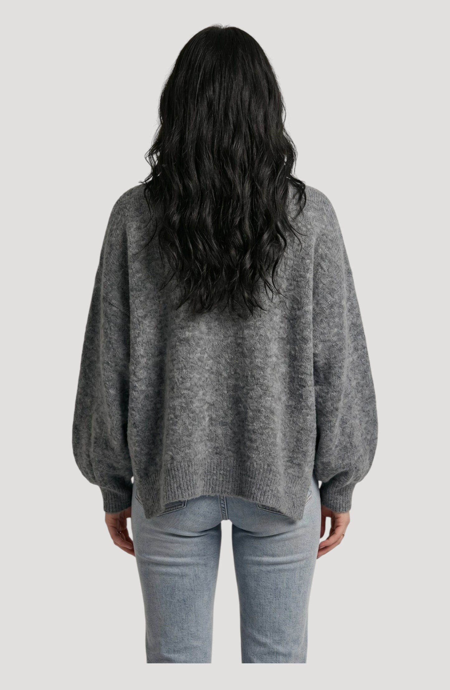 LORVENE cropped rib pullover displayed in a top-right pose, showcasing its fitted style and ribbed texture.