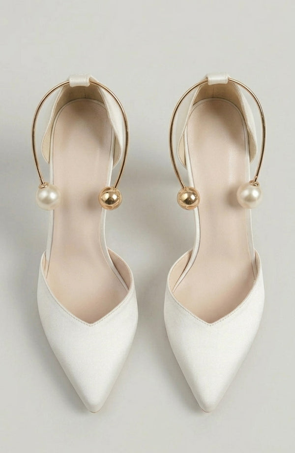LORVENE Icon Charm Heels featuring stylish design with decorative charms and a sleek silhouette for elegant footwear. (600x920)