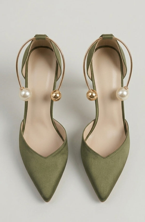 LORVENE Icon Charm Heels showing stylish black heels with decorative icon charms on the straps. (600x920)