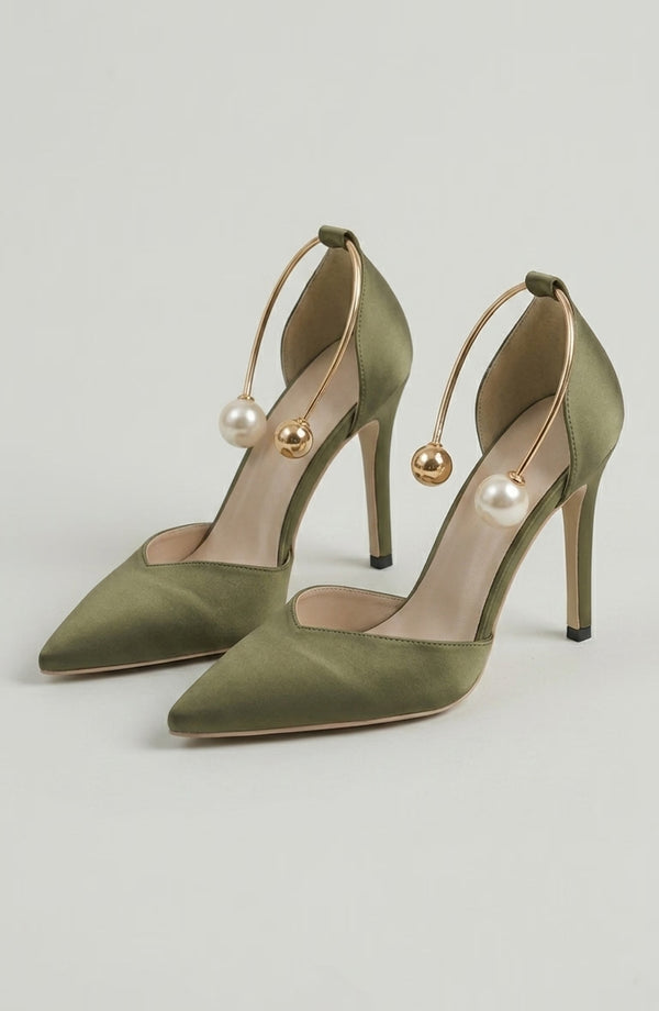LORVENE Icon Charm Heels with stylish design and pointed toe, featuring decorative icons on the black high-heeled shoes. (600x920)