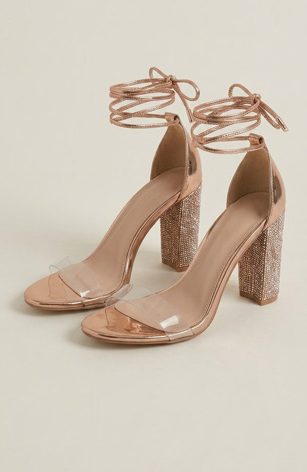 LORVENE Nova Elegance heels in black leather with pointed toes and stiletto heels, displayed on a neutral background. (600x920)