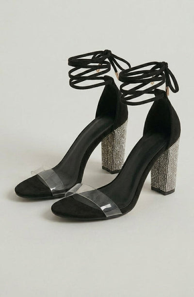 LORVENE Nova Elegance heels in black leather with pointed toes and stiletto heels, displayed on a white background. (600x920)