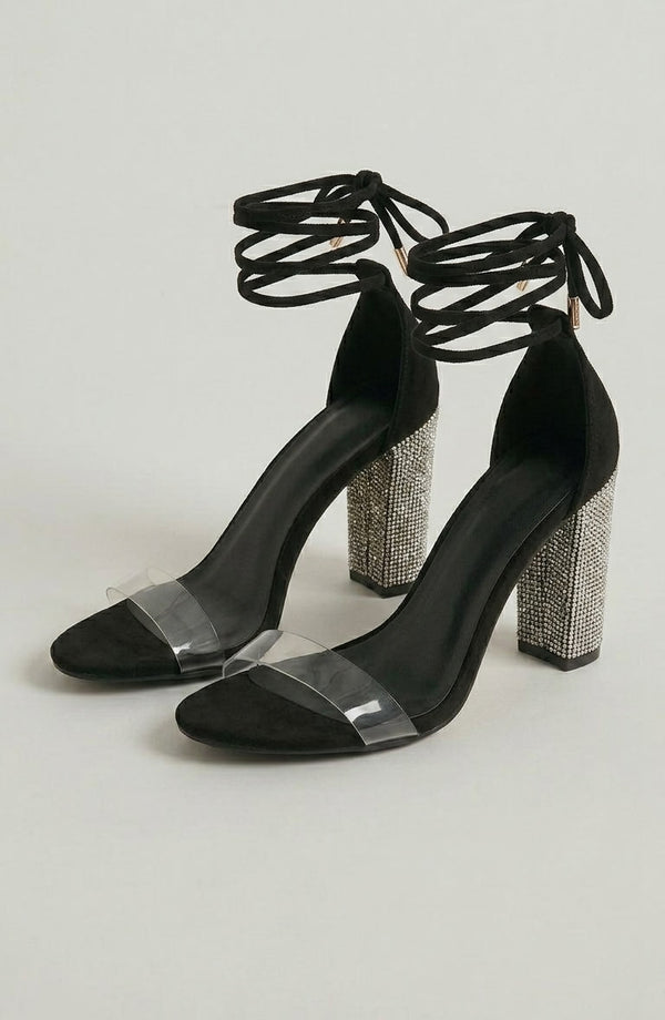 LORVENE Nova Elegance heels in black leather with pointed toes and stiletto heels, displayed on a white background. (600x920)