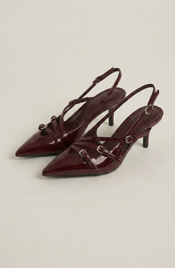 LORVENES patent strap heels with sleek design, featuring slender straps and pointed toes, on a neutral background. (600x920)
