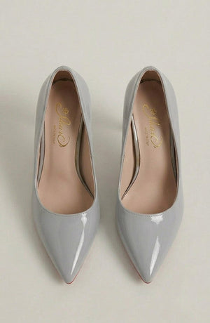 LORVENES Pure Essence heels in nude with pointed toe and stiletto heel, displayed on a neutral background. (600x920)