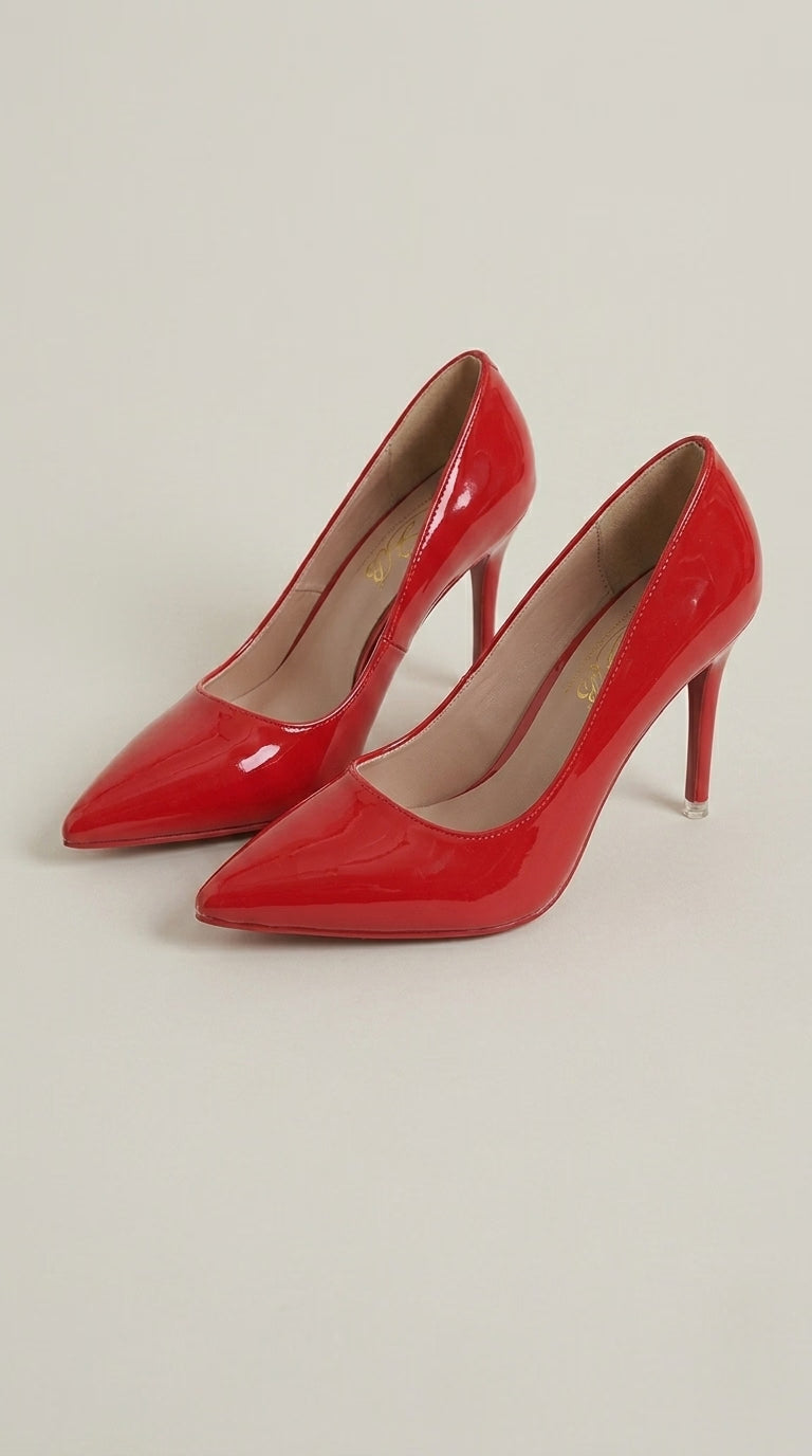 LORVENES Pure Essence heels, stylish black high-heeled shoes with pointed toes and sleek design, shown on a white background.