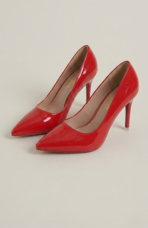LORVENES Pure Essence heels, stylish black high-heeled shoes with pointed toes and sleek design, shown on a white background. (600x920)