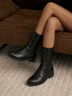 LORVENES classic military boots with sturdy leather and rugged sole, designed for durability and outdoor wear.