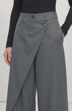 LORVENE Curve Form Pants displayed from the bottom left angle, showcasing the fit and fabric texture of the stylish trousers.