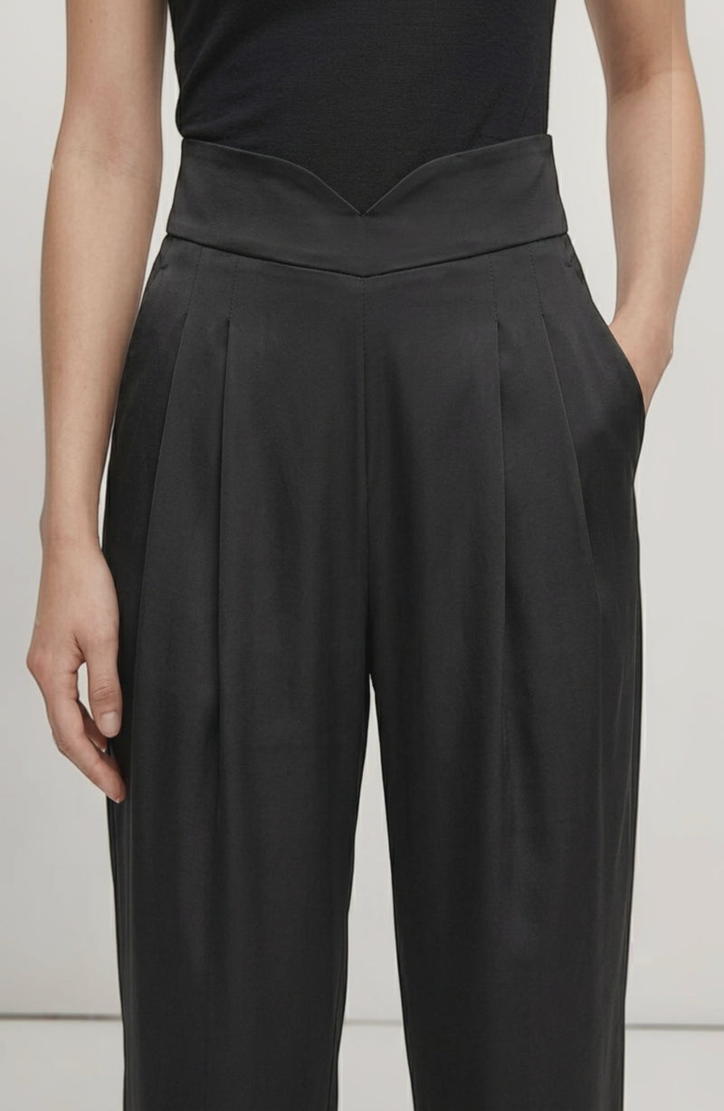 LORVENE Line Edge Pants shown from bottom left pose, featuring sleek design and tailored fit in a modern style.