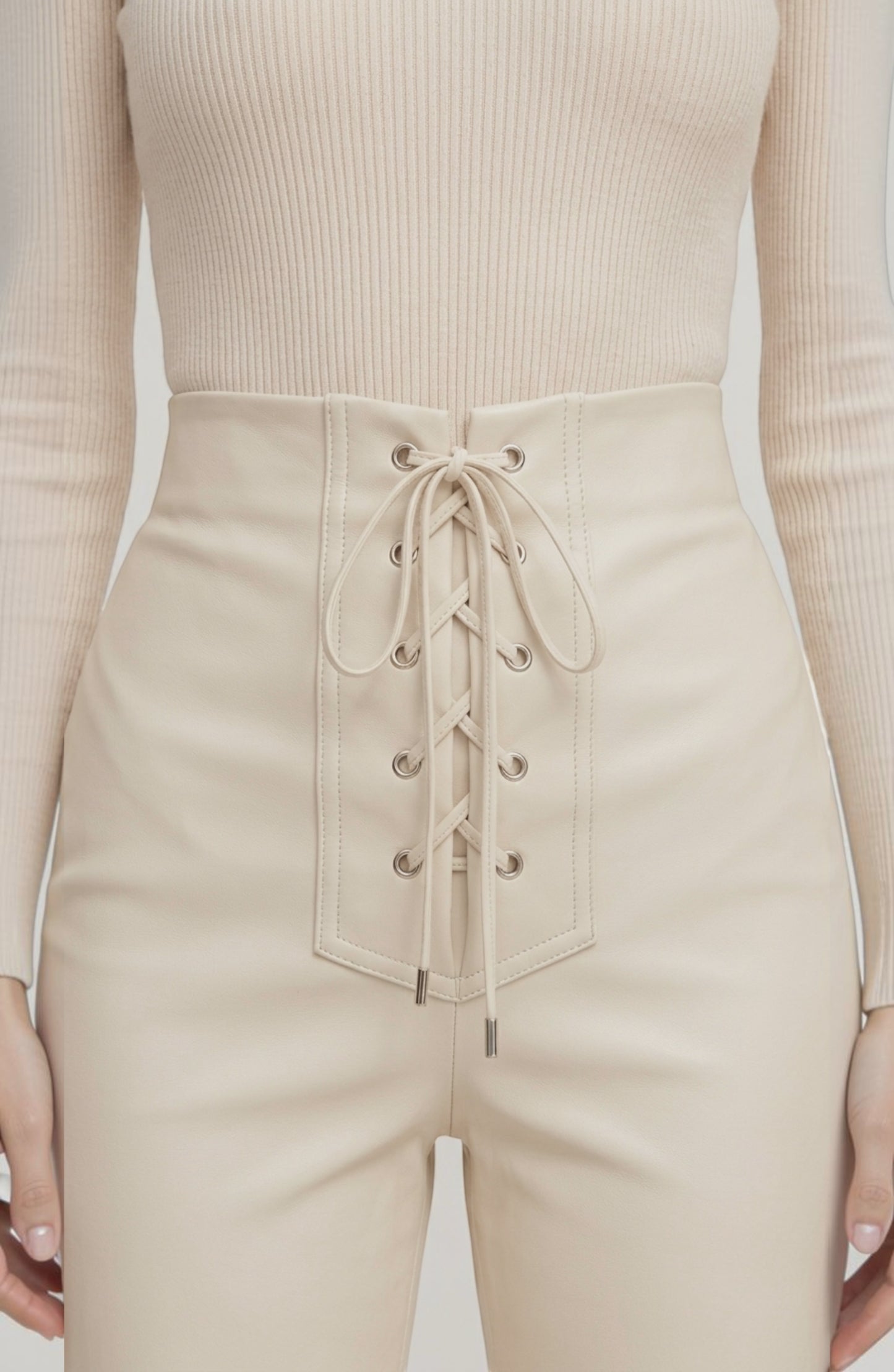 LORVENE Line Mode Pants shown from a bottom left pose, featuring sleek design and stylish fit in a modern fashion image.