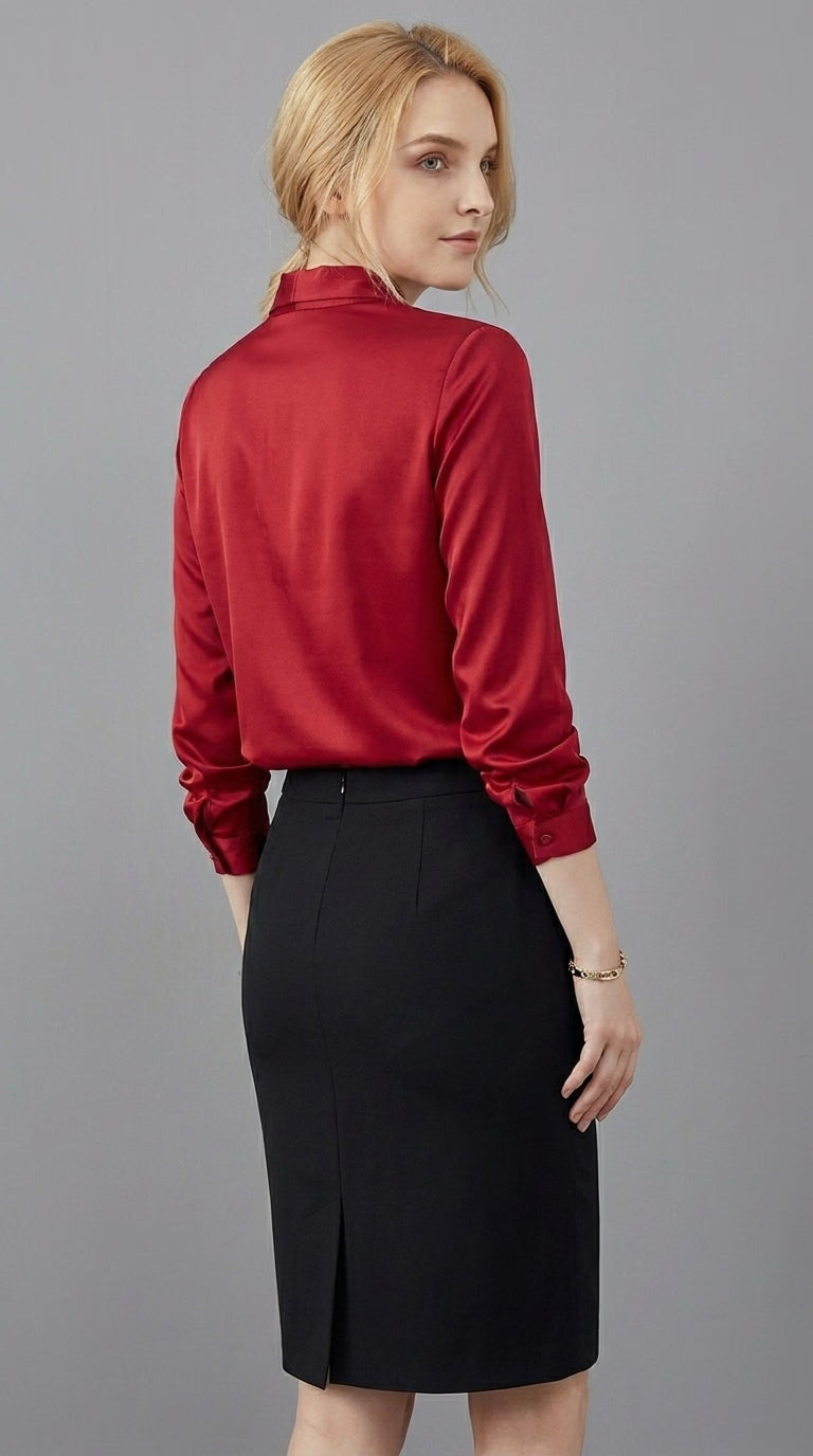 LORVENE double pocket shirt with button-up front and long sleeves, shown in a close-up view of the bottom right section.