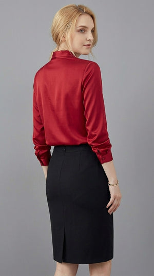 LORVENE double pocket shirt with button-up front and long sleeves, shown in a close-up view of the bottom right section.