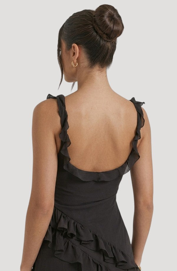 LORVENE Midnight Petal Maxi dress featuring a flowing black floral design and elegant floor-length silhouette.