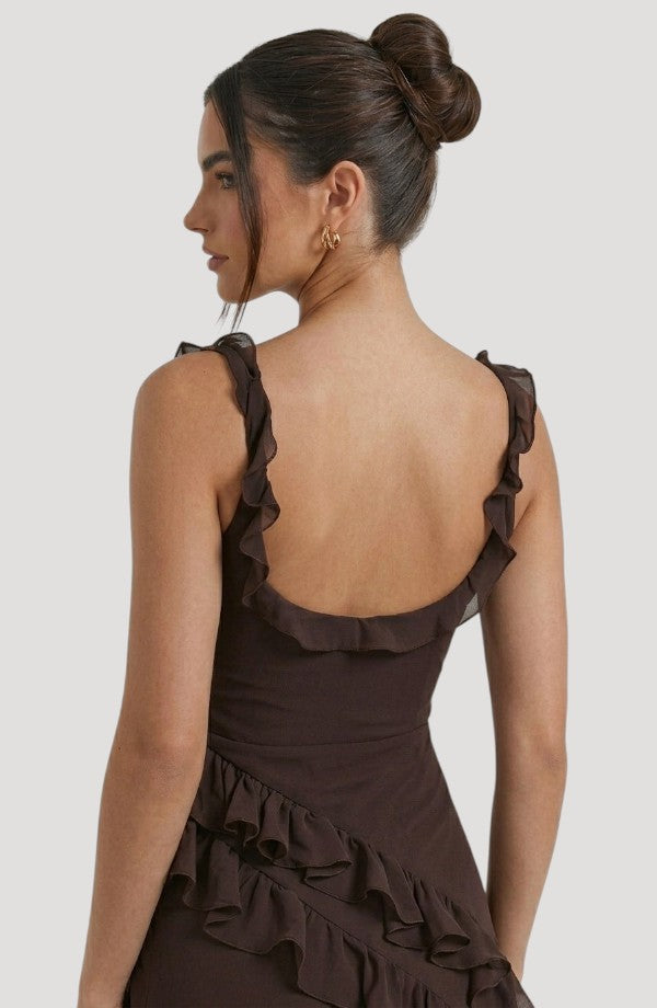 LORVENE Midnight Petal Maxi dress shown from bottom right, flowing black maxi with floral details and elegant design.