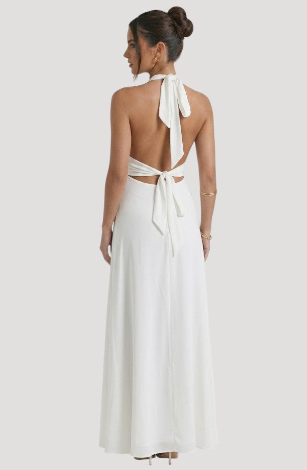 LORVENE Luxe Draped Dress shown from the bottom right, featuring elegant fabric draping and stylish design details.