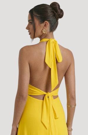 LORVENE Luxe Draped Dress shown from the bottom right angle, featuring elegant fabric draping and a sophisticated silhouette.