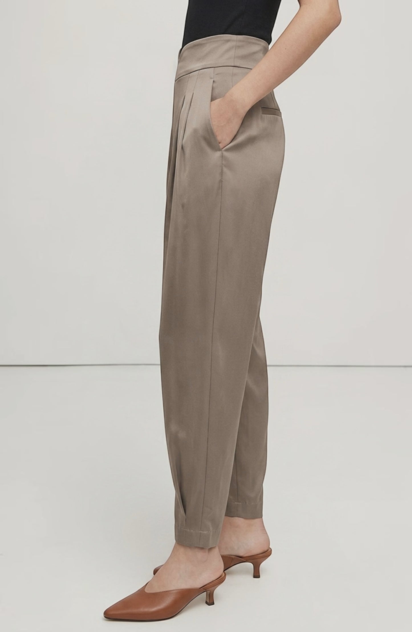 LORVENE Line Edge Pants shown from the bottom right pose, featuring sleek design and tailored fit in a neutral color.