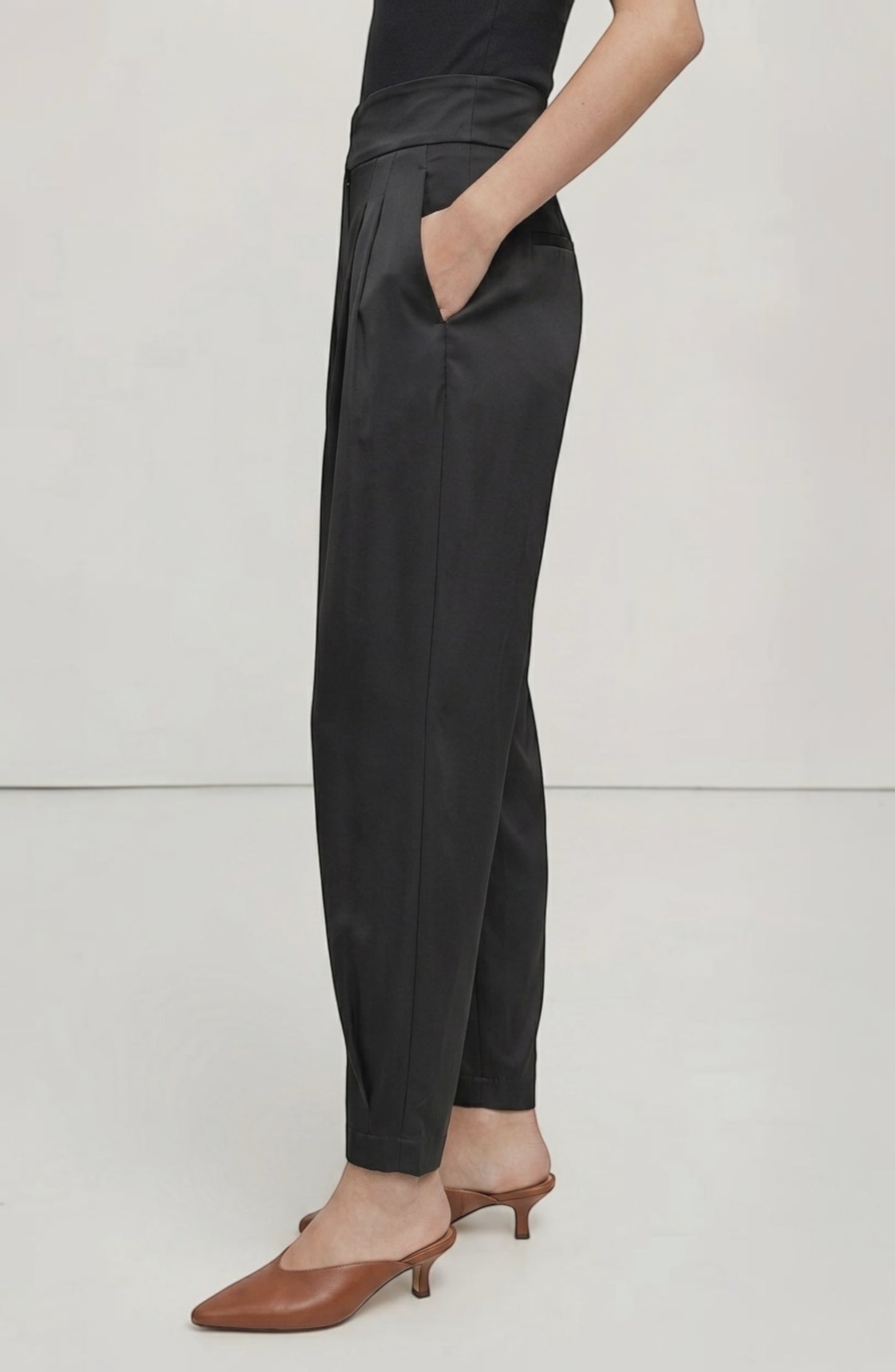 LORVENE Line Edge Pants shown from bottom right angle, featuring sleek design and tailored fit in a modern fashion style.