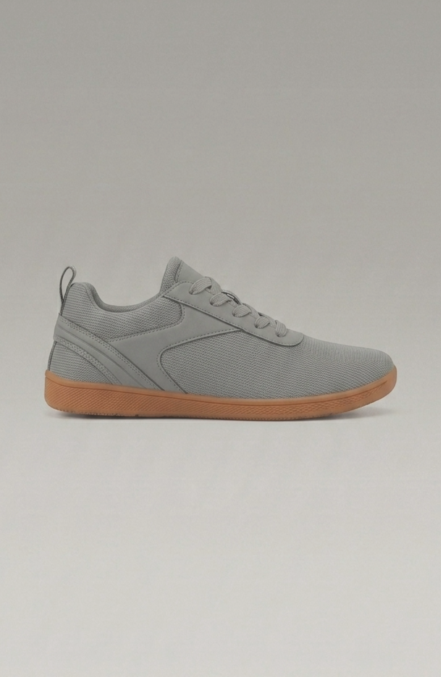 LORVENE Glide Flare Sneakers featuring a sleek design with white laces and a modern silhouette, displayed on a neutral background.