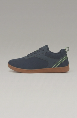 LORVENE Glide Flare Sneakers shown from the bottom left angle, featuring white and beige design with a chunky sole.