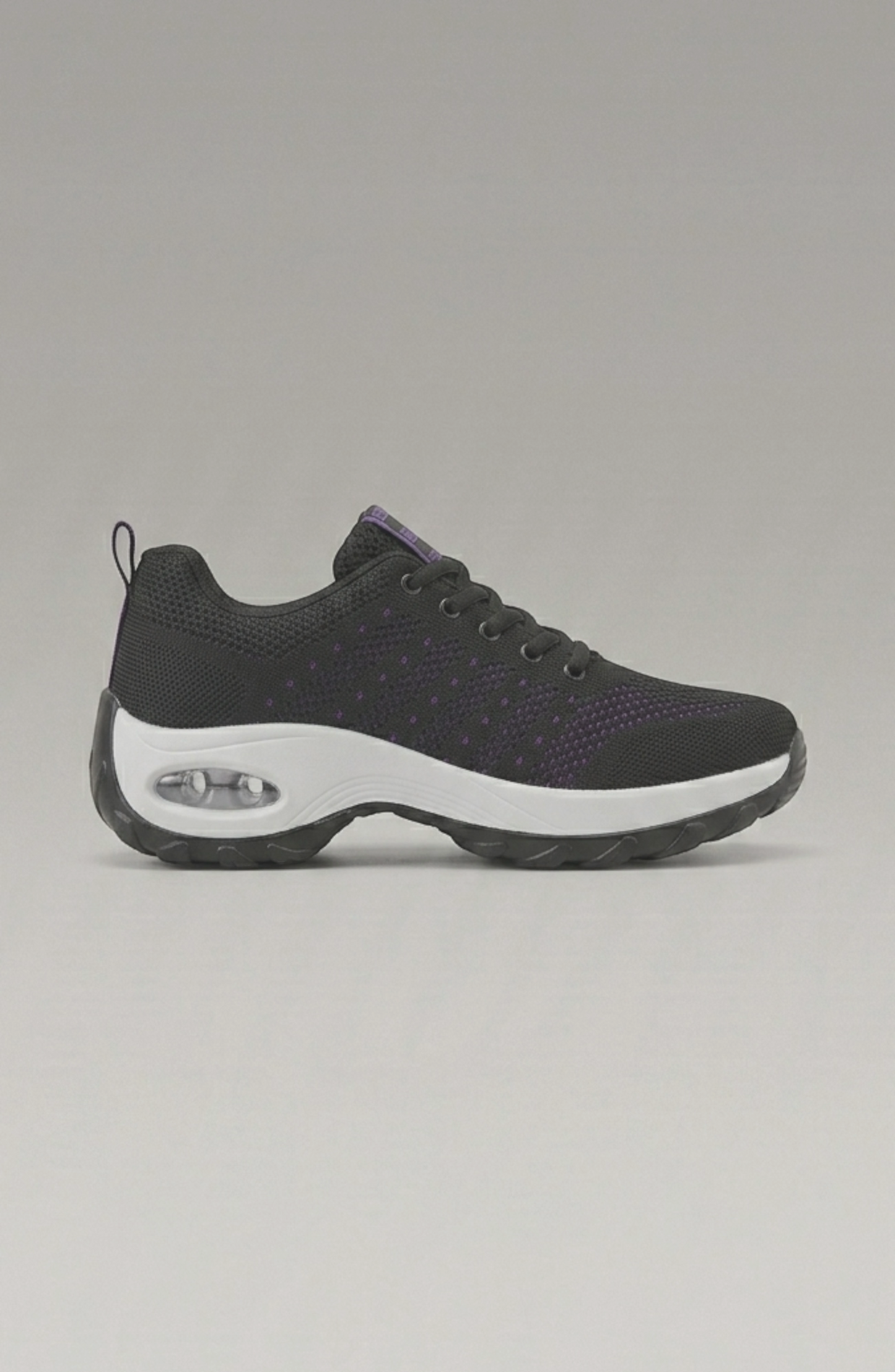LORVENE Ice Walk Sneakers shown from the bottom left angle, featuring sturdy soles and stylish design for winter outdoor wear.