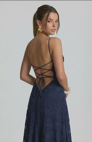 LORVENES sexy flowy bridal dress with delicate fabric and elegant design, shown from the bottom left angle.