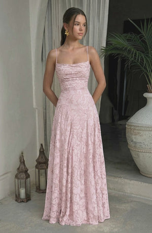 Flowy bridal dress by LORVENES featuring soft, elegant fabric and a flowing silhouette, perfect for wedding ceremonies and photo sessions.
