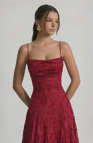 Elegant flowy bridal dress by LORVENES featuring a soft fabric, delicate design, and a graceful silhouette for a wedding gown.