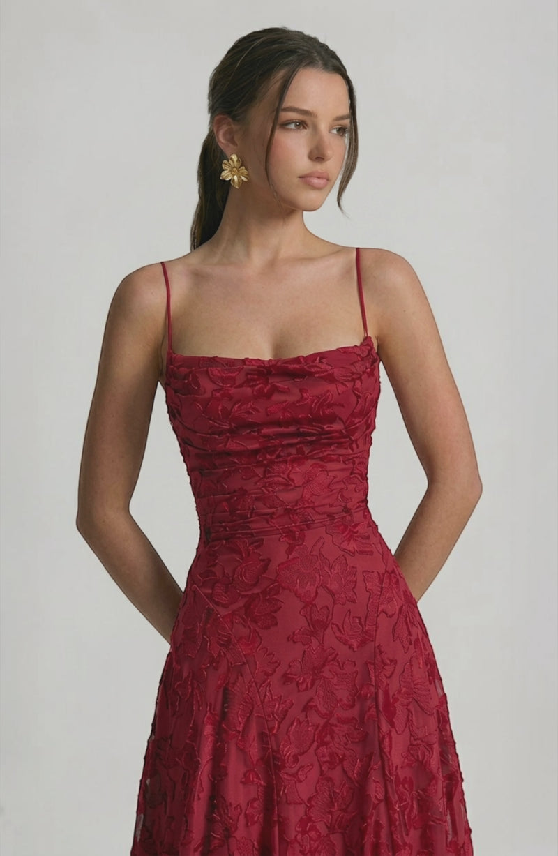 Elegant flowy bridal dress by LORVENES featuring a soft fabric, delicate design, and a graceful silhouette for a wedding gown.
