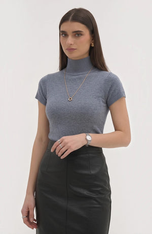 LORVENE Pure Poly Blend High Neck sweater in neutral color, close-up of the soft fabric and high neckline detail.