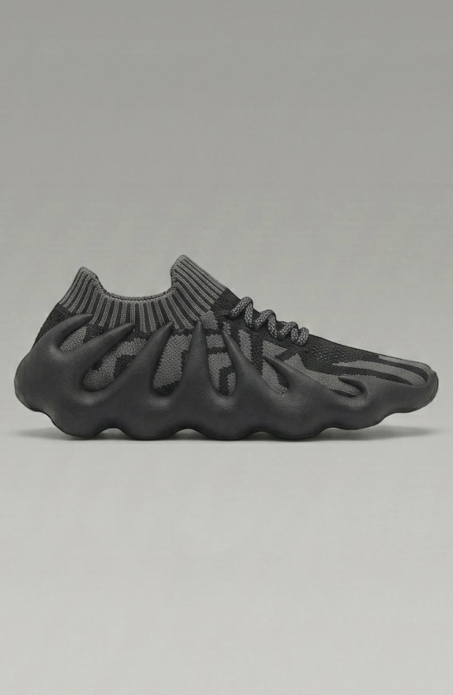 LORVENES Midnight Muse sneakers in black with white soles, featuring stylish laces and modern design for casual wear.