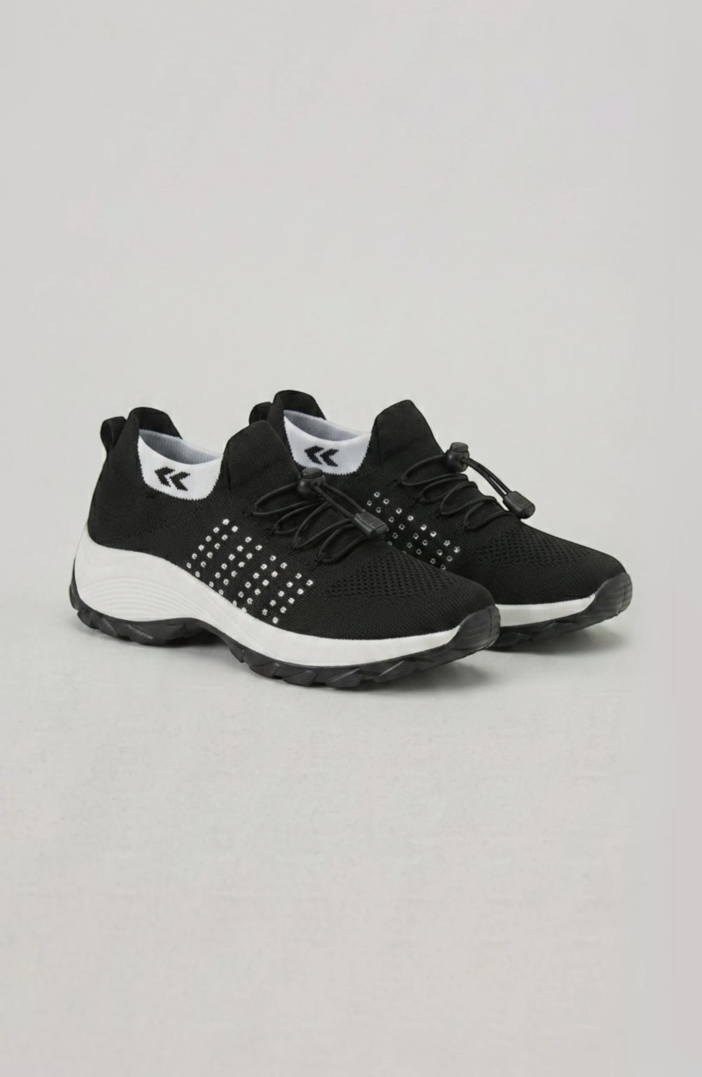 LORVENE Calm Glow sneakers featuring a sleek design with white and pastel accents, displayed on a plain background.