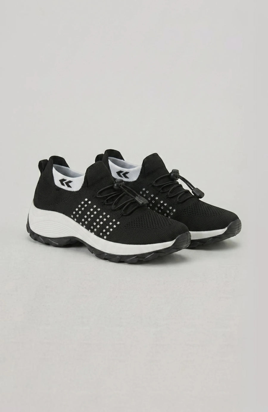 LORVENE Calm Glow sneakers featuring a sleek design with white and pastel accents, displayed on a plain background.