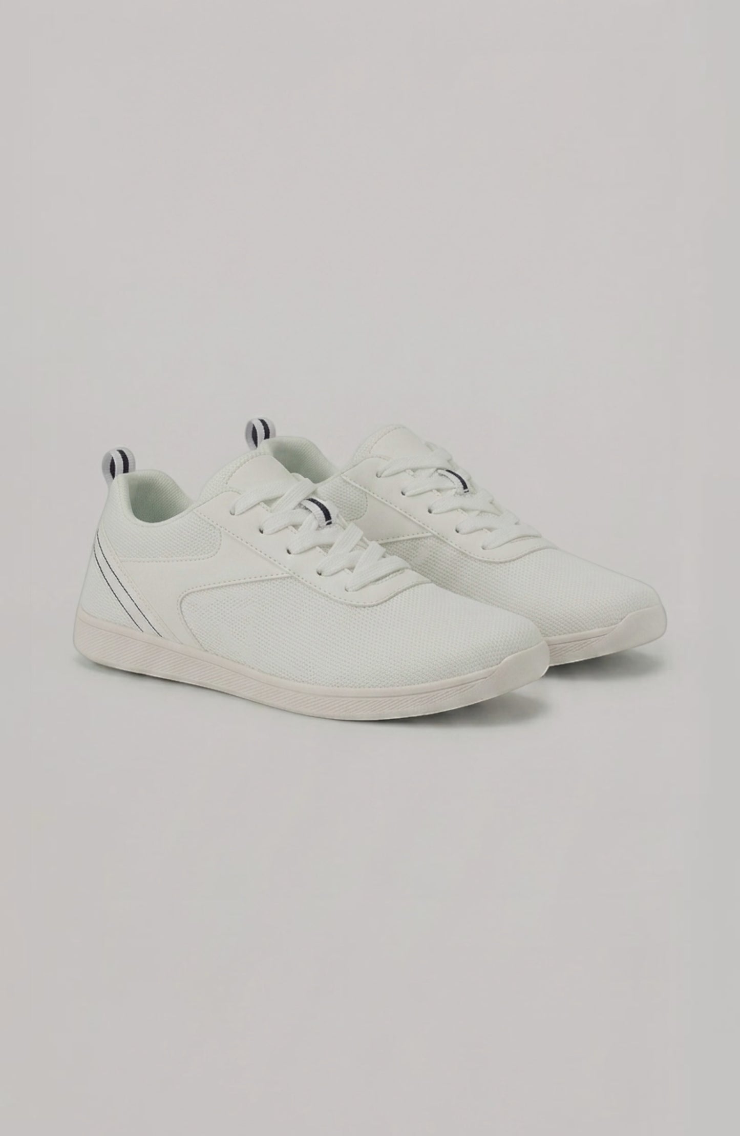 LORVENE Glide Flare Sneakers in white with chunky soles and stylish design, shown from a side angle on a plain background.