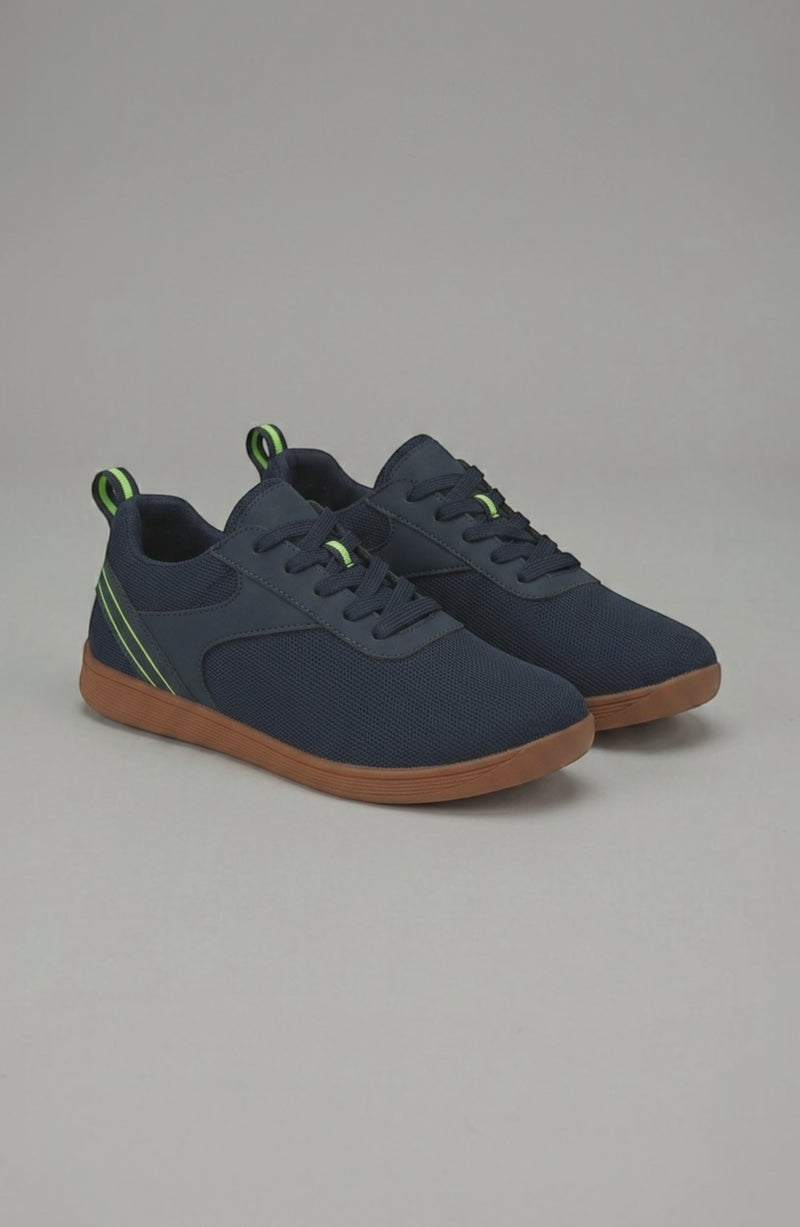 LORVENE Glide Flare Sneakers with white and black design, showcasing stylish casual footwear with flare soles and modern details.