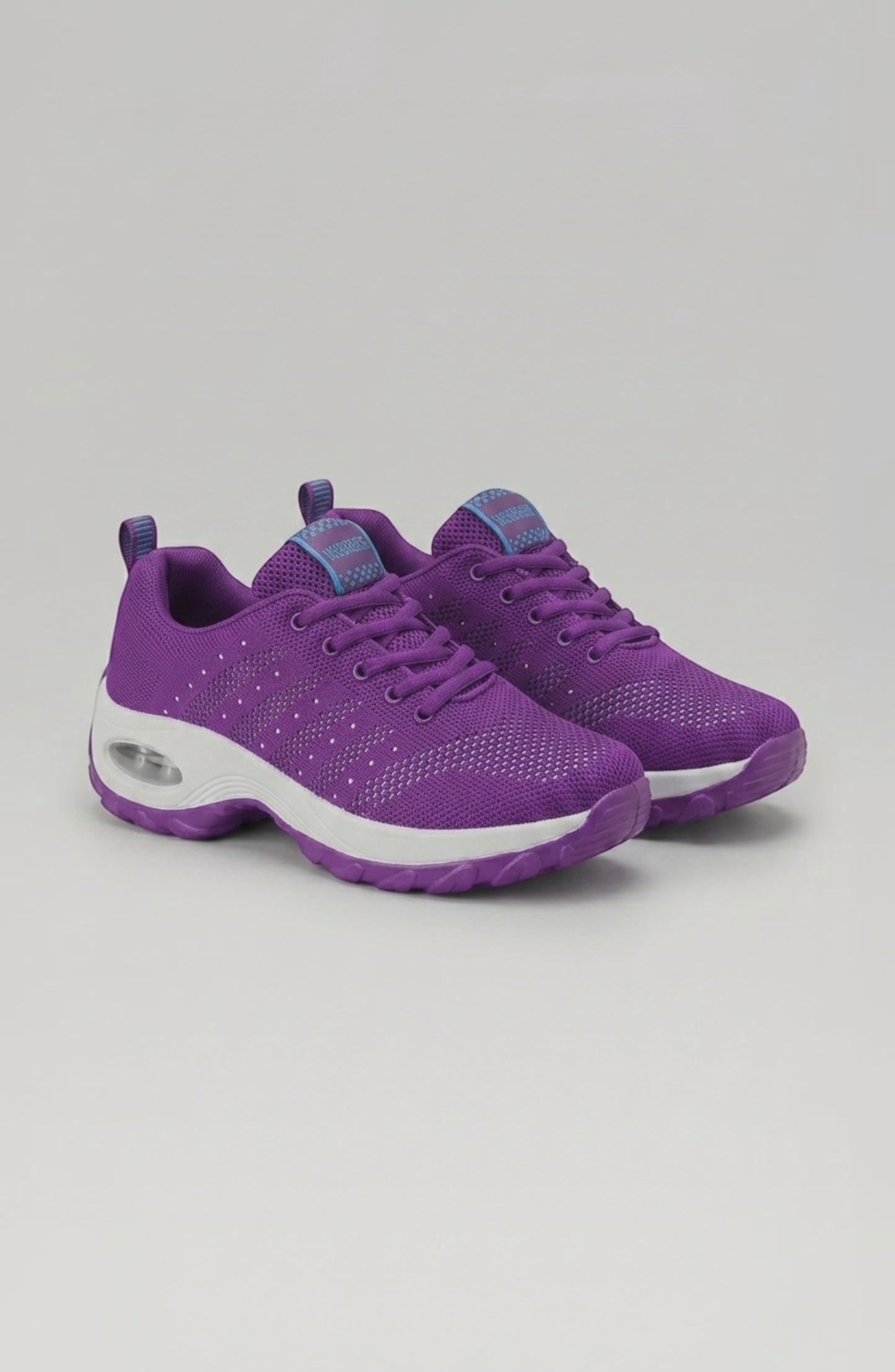 LORVENE Ice Walk sneakers in white with textured soles, designed for winter traction and outdoor walking.