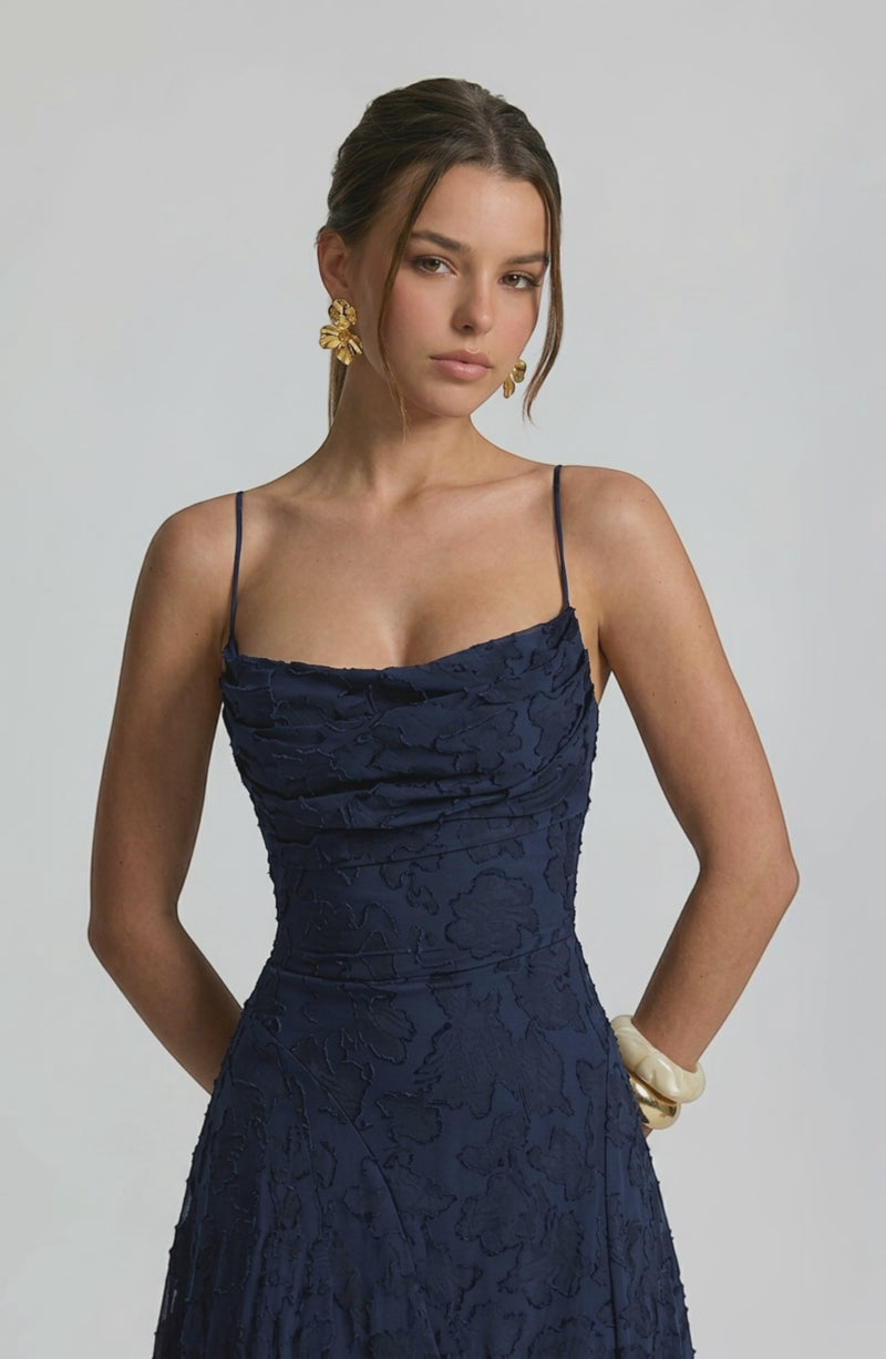 LORVENES sexy flowy bridal dress with elegant draping and delicate fabric, perfect for a romantic wedding look.