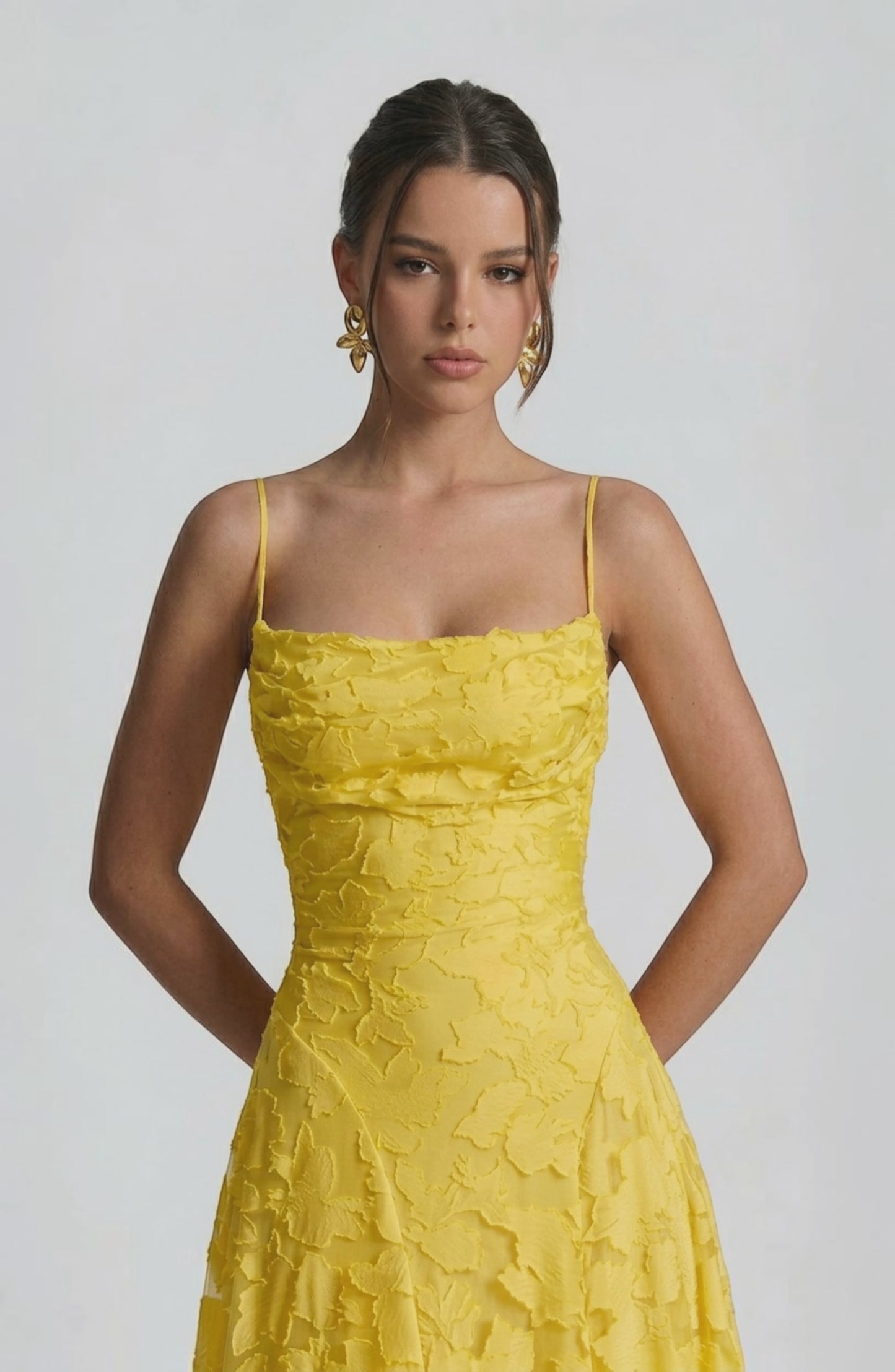 LORVENES sexy flowy bridal dress with elegant fabric and delicate design, shown from the bottom right angle.