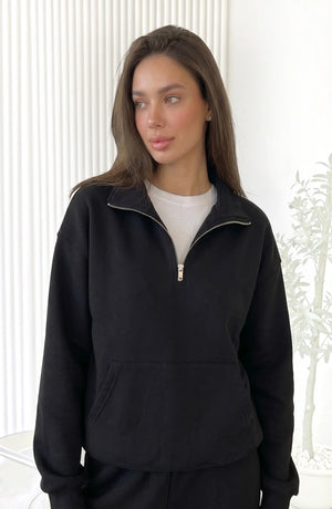 LORVENES cotton knit lounge set with long sleeves and relaxed fit, shown in soft pastel color on a wooden background