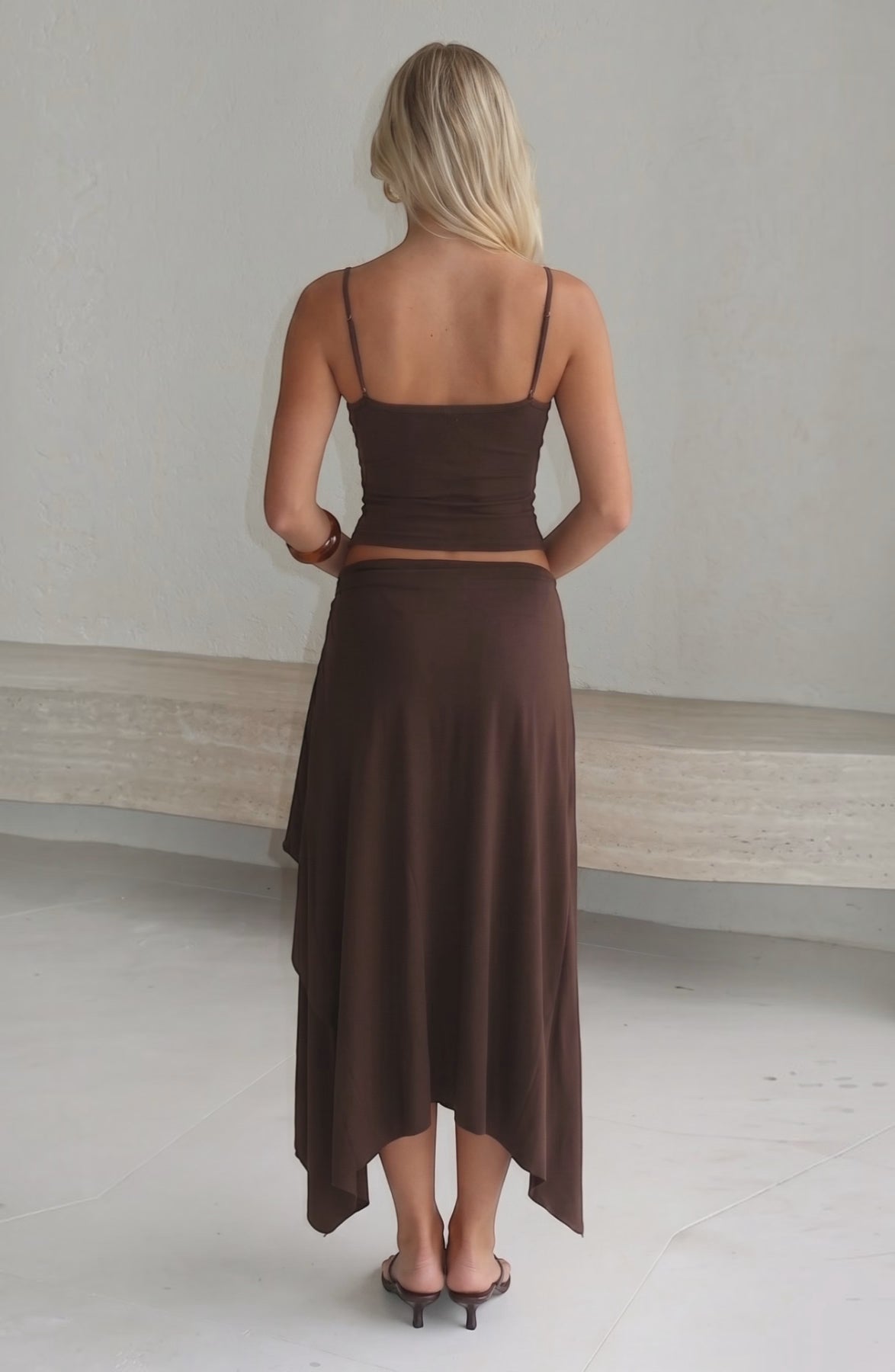 LORVENES 2025 summer two-piece set with solid camisole tank top and ruffled irregular skirt, stylish and trendy for warm weather.
